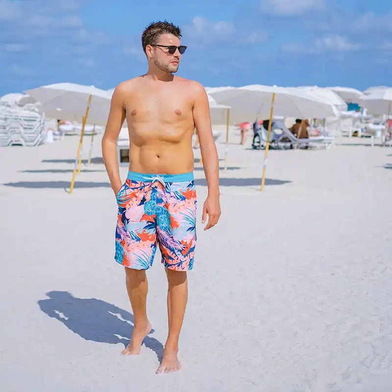 Man in floral swim trunks.